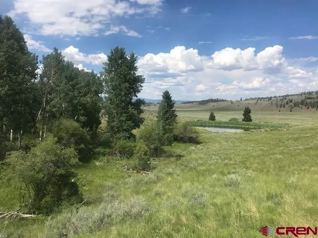 a view of a lake with a mountain in the background