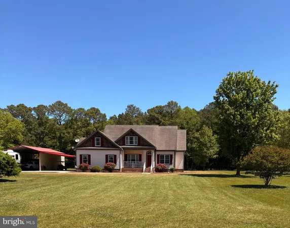 a view of a house with a big yard