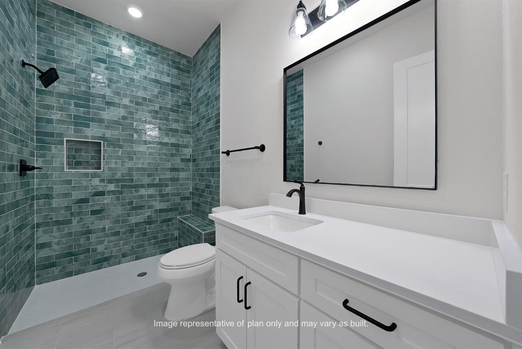 10641 Rye Bread Lane Venus, TX 76084 - Photo 11 of 13 a bathroom with a sink a toilet and shower