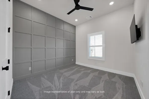 a view of a livingroom with a flat screen tv