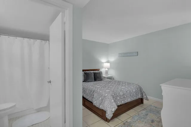 a living room with a bed and a couch