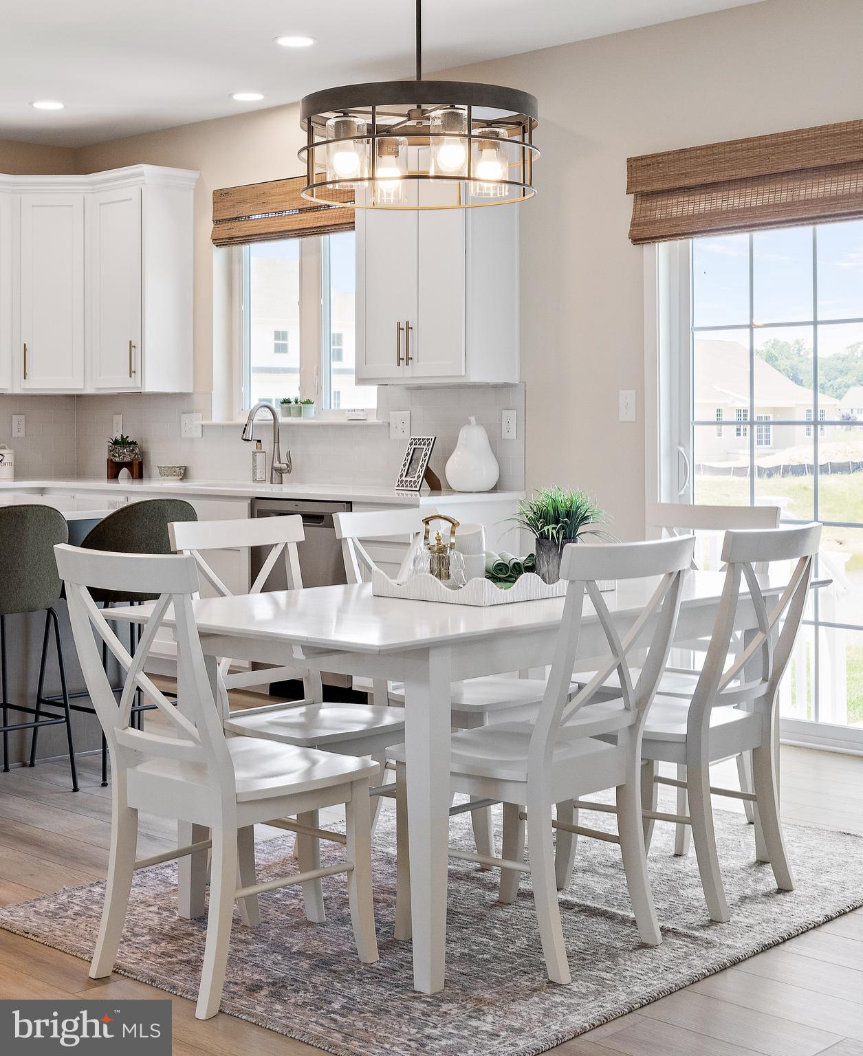 5 B Little Baltimore Road Newark, DE 19711 - Photo 11 of 40 a kitchen with a table chairs stove and cabinets