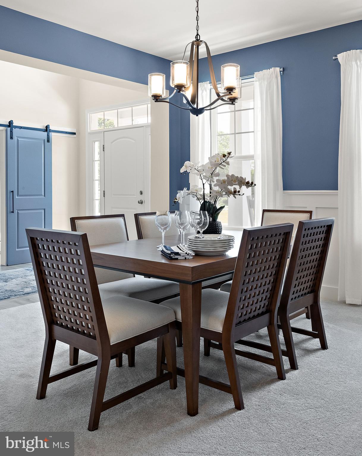 5 B Little Baltimore Road Newark, DE 19711 - Photo 5 of 40 a view of a dining room with furniture window and wooden floor
