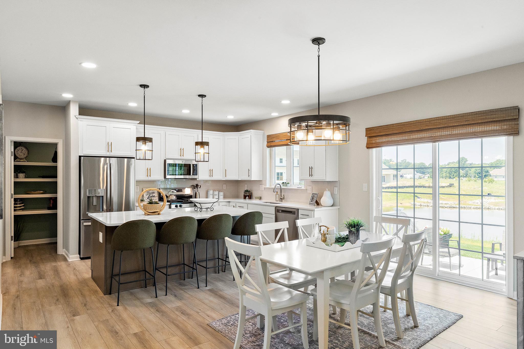 5 B Little Baltimore Road Newark, DE 19711 - Photo 10 of 40 a view of a dining room with furniture window and wooden floor