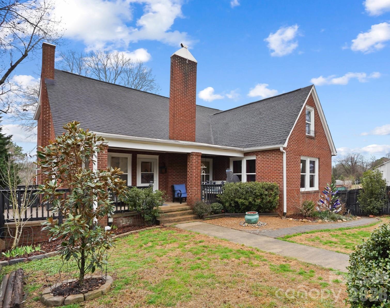 514 Jackson Park Road Kannapolis, NC 28083 - Photo 1 of 48 a front view of house with yard and trees around