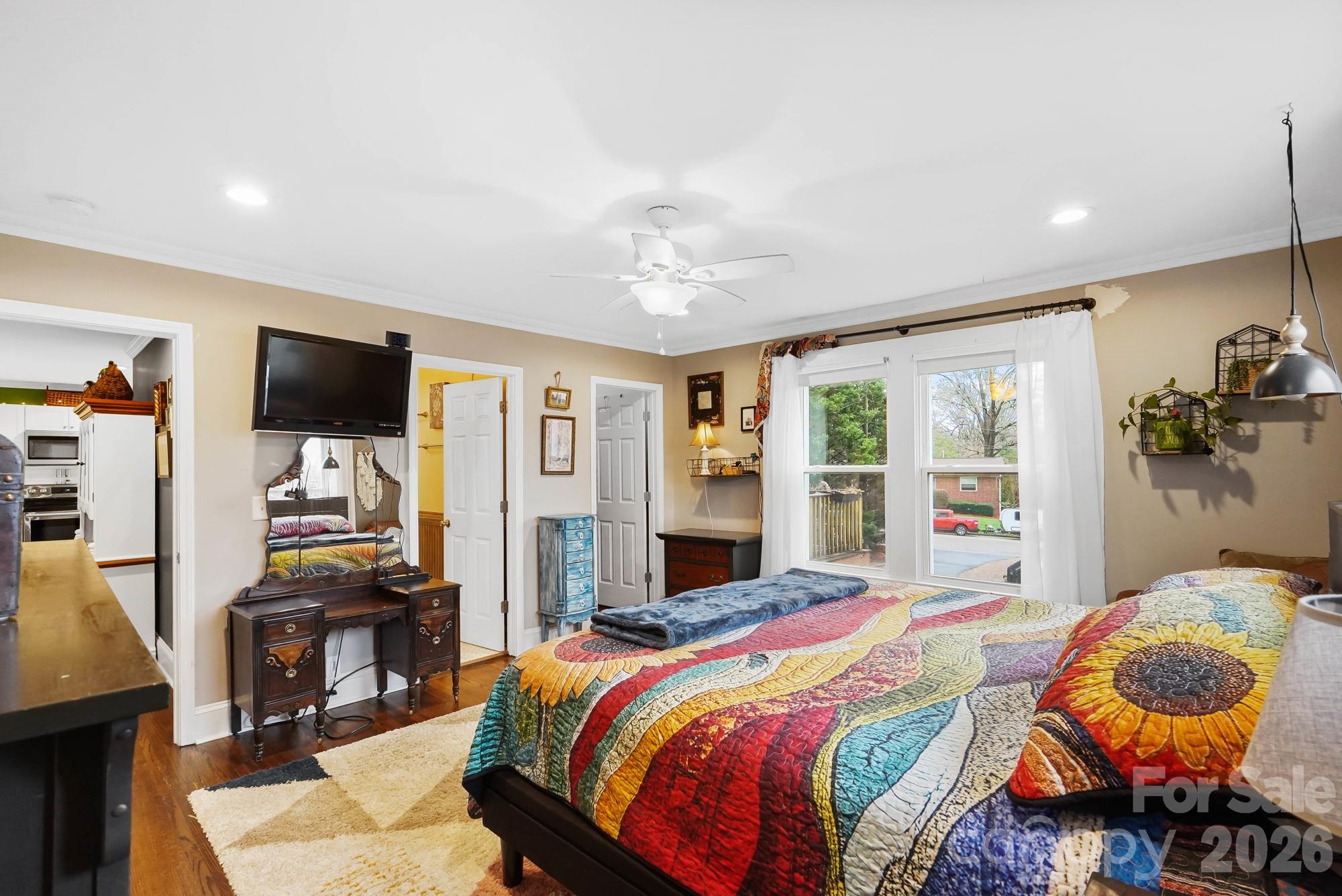 514 Jackson Park Road Kannapolis, NC 28083 - Photo 15 of 48 a bedroom with a bed and flat screen tv