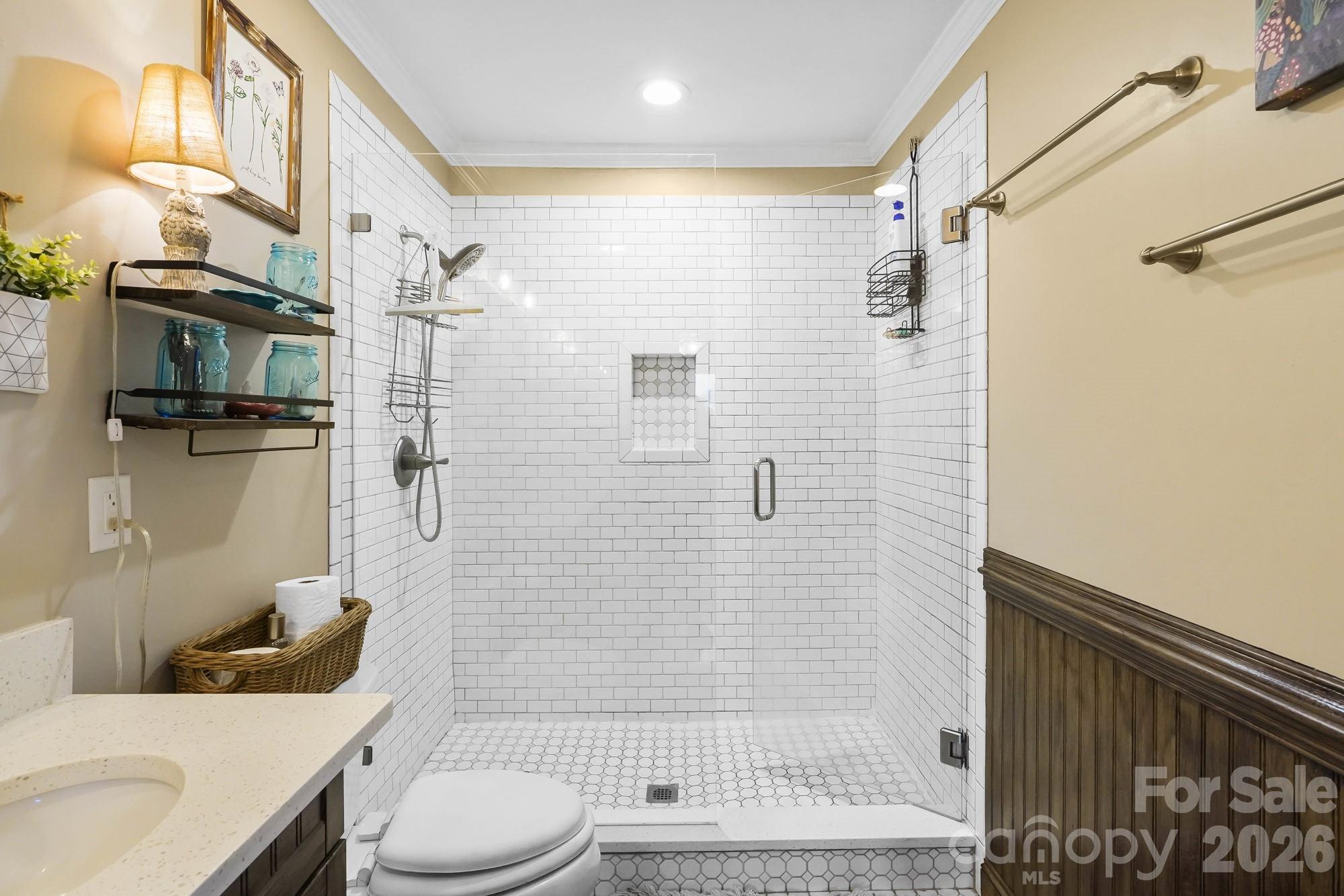 514 Jackson Park Road Kannapolis, NC 28083 - Photo 17 of 48 a bathroom with a sink toilet and shower