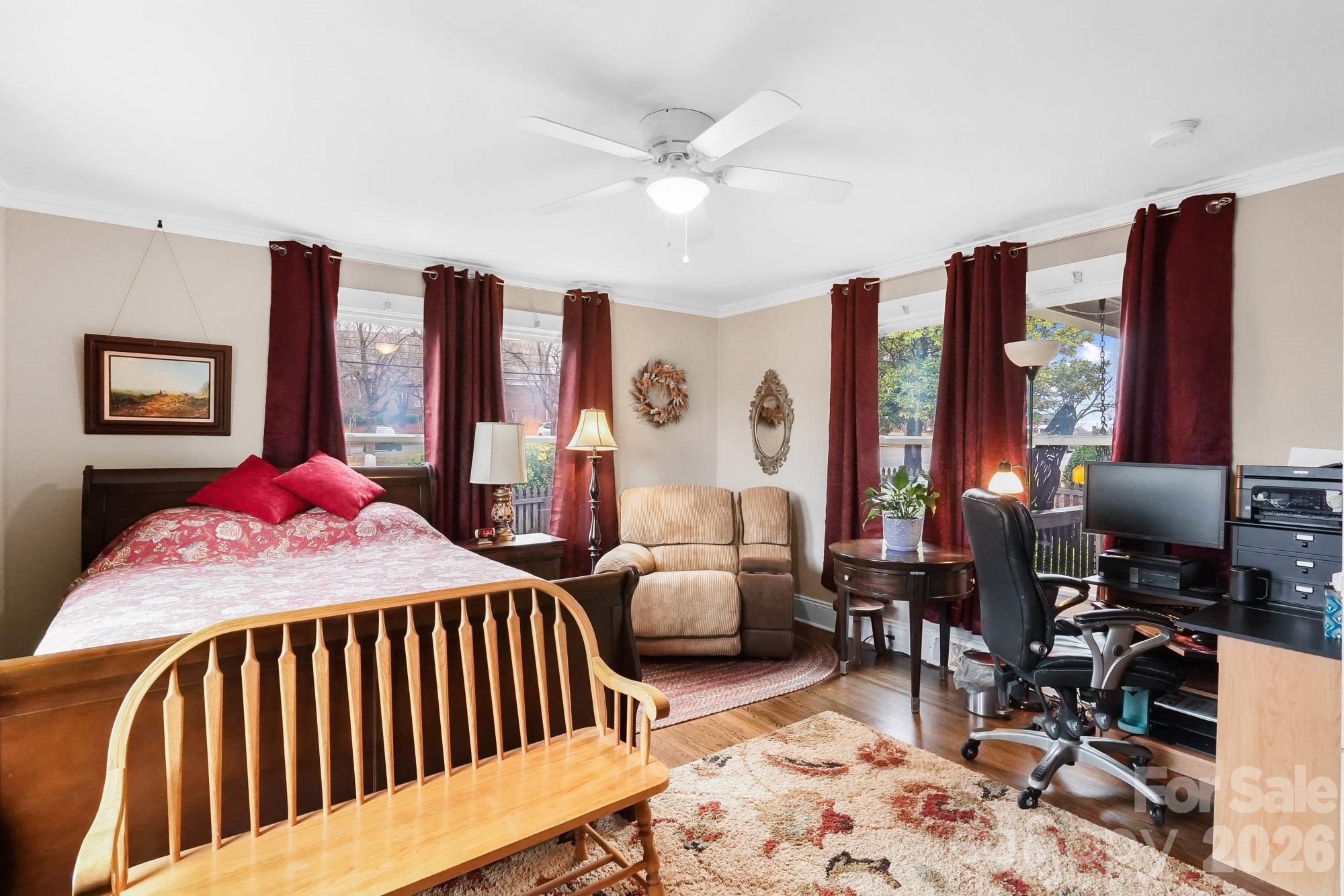 514 Jackson Park Road Kannapolis, NC 28083 - Photo 18 of 48 a bedroom with a bed a table and chair