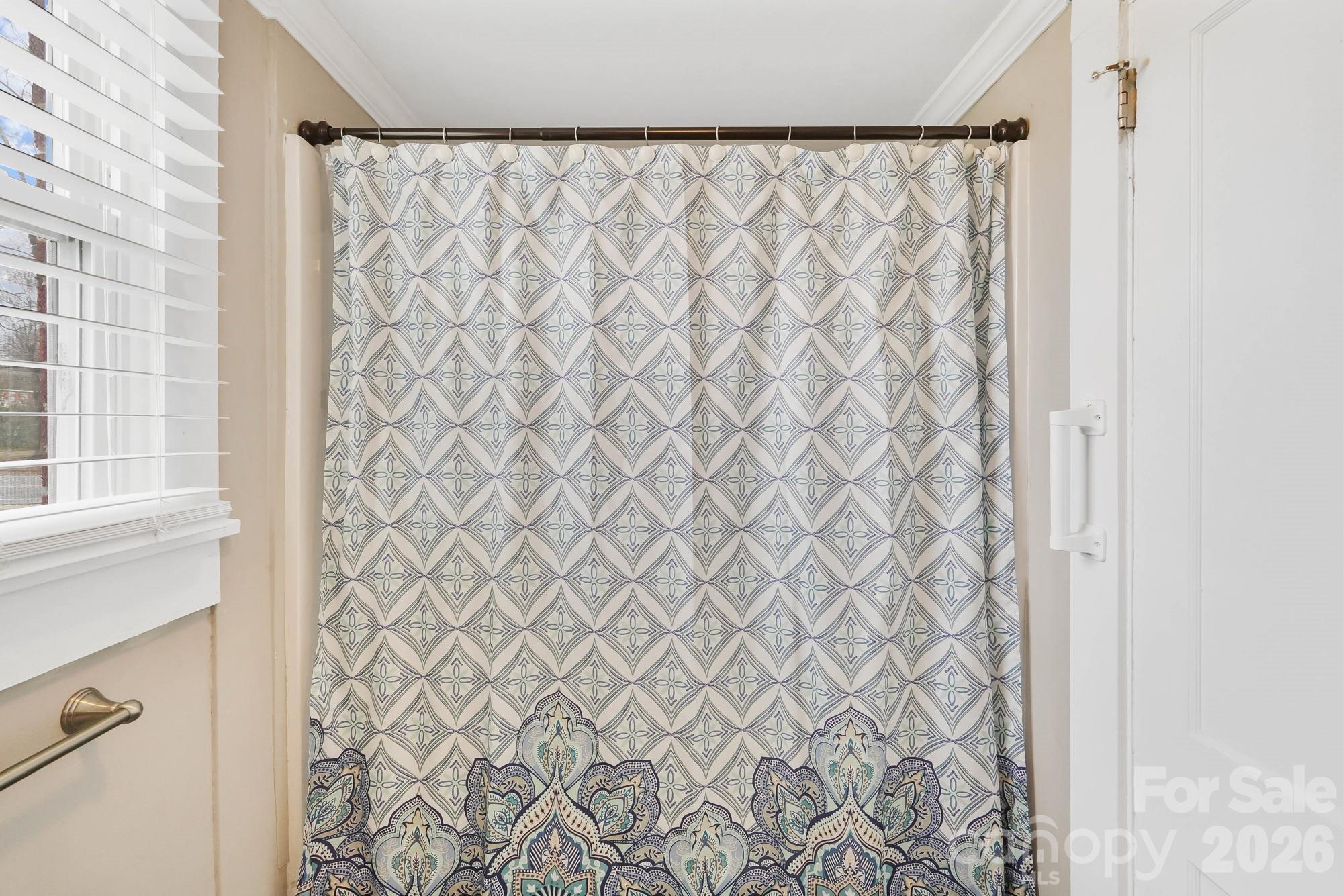 514 Jackson Park Road Kannapolis, NC 28083 - Photo 21 of 48 a bathroom with a shower curtain and curtain