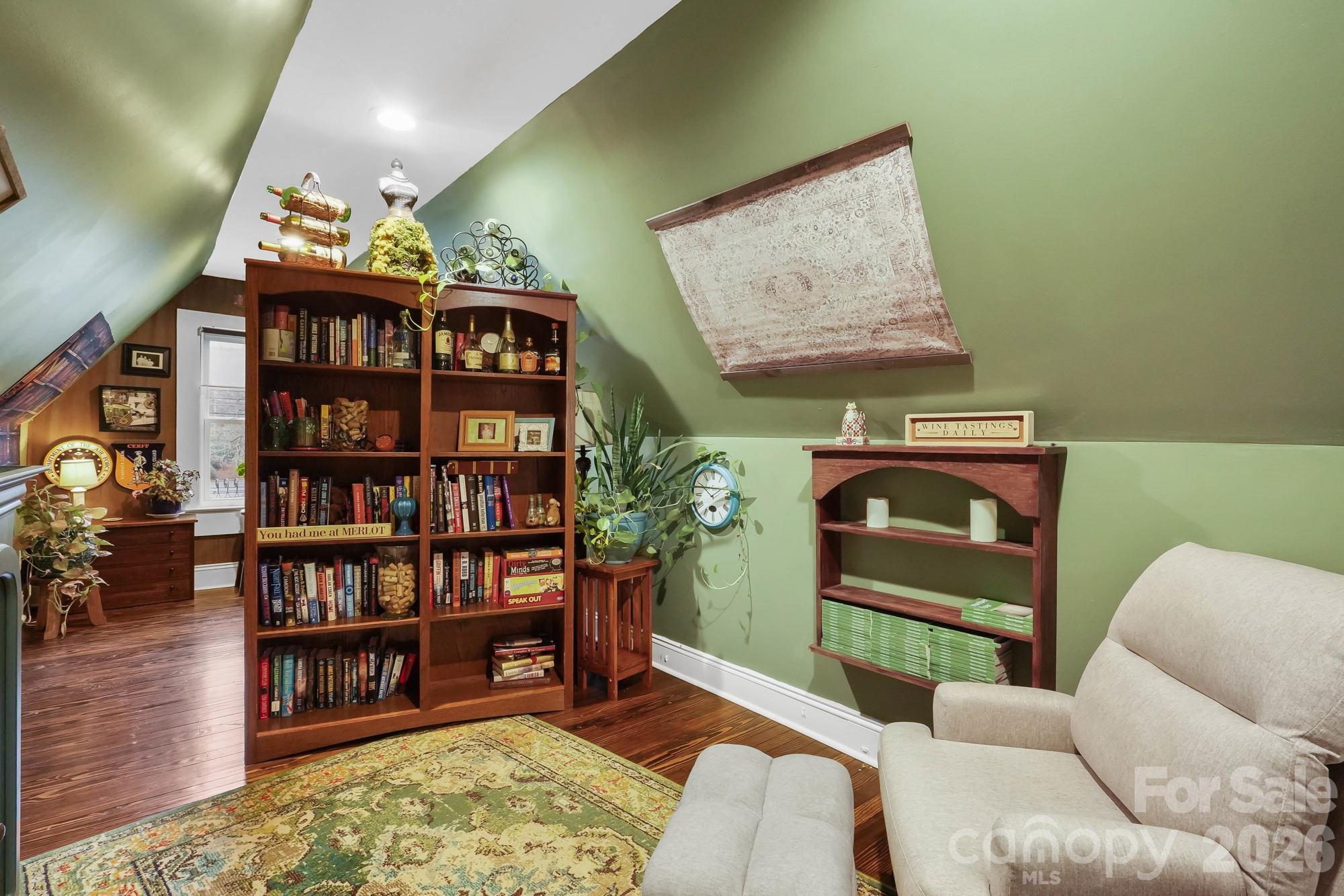 514 Jackson Park Road Kannapolis, NC 28083 - Photo 25 of 48 a living room with furniture and a book shelf