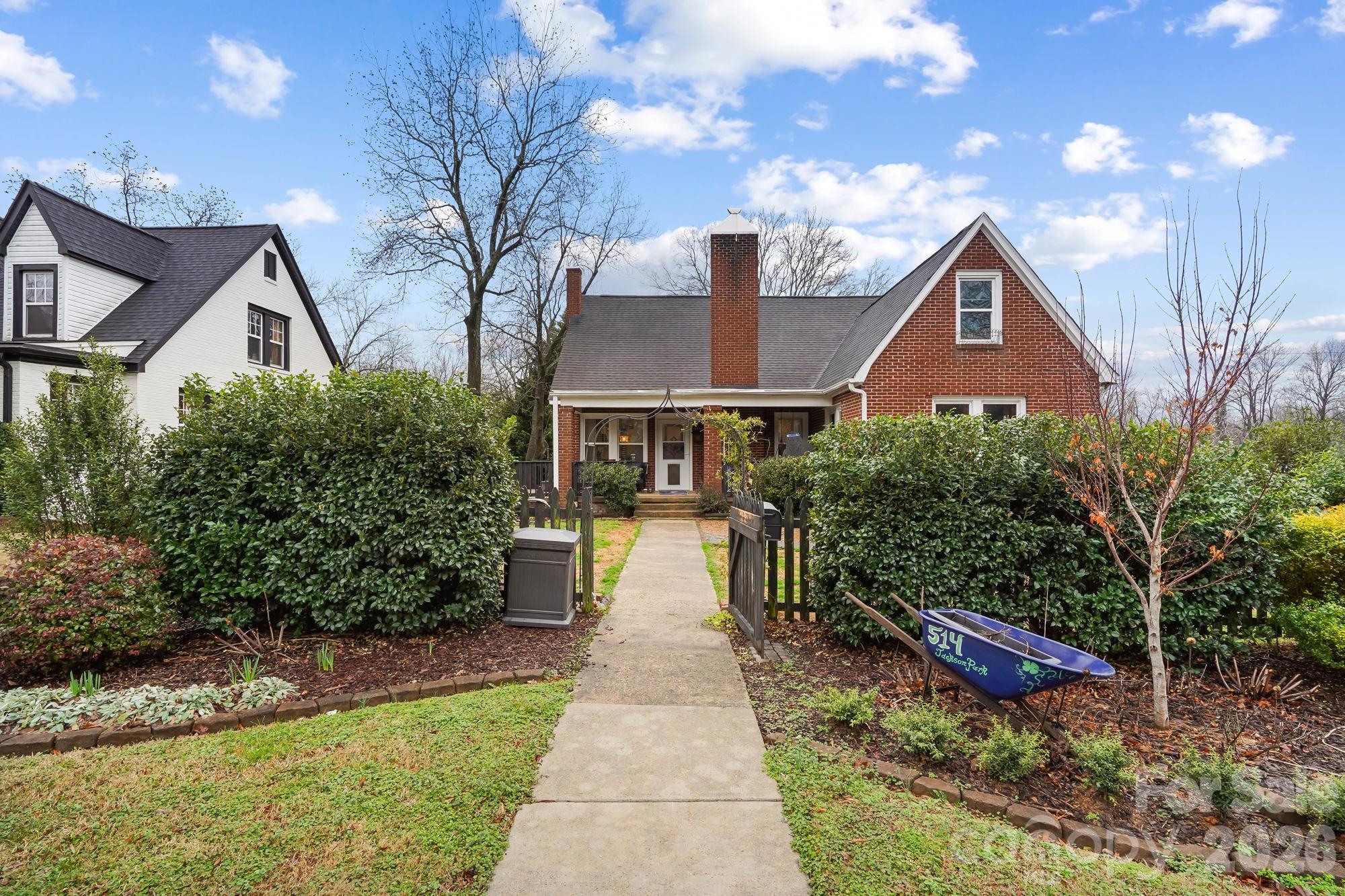 514 Jackson Park Road Kannapolis, NC 28083 - Photo 3 of 48 a front view of a house with garden