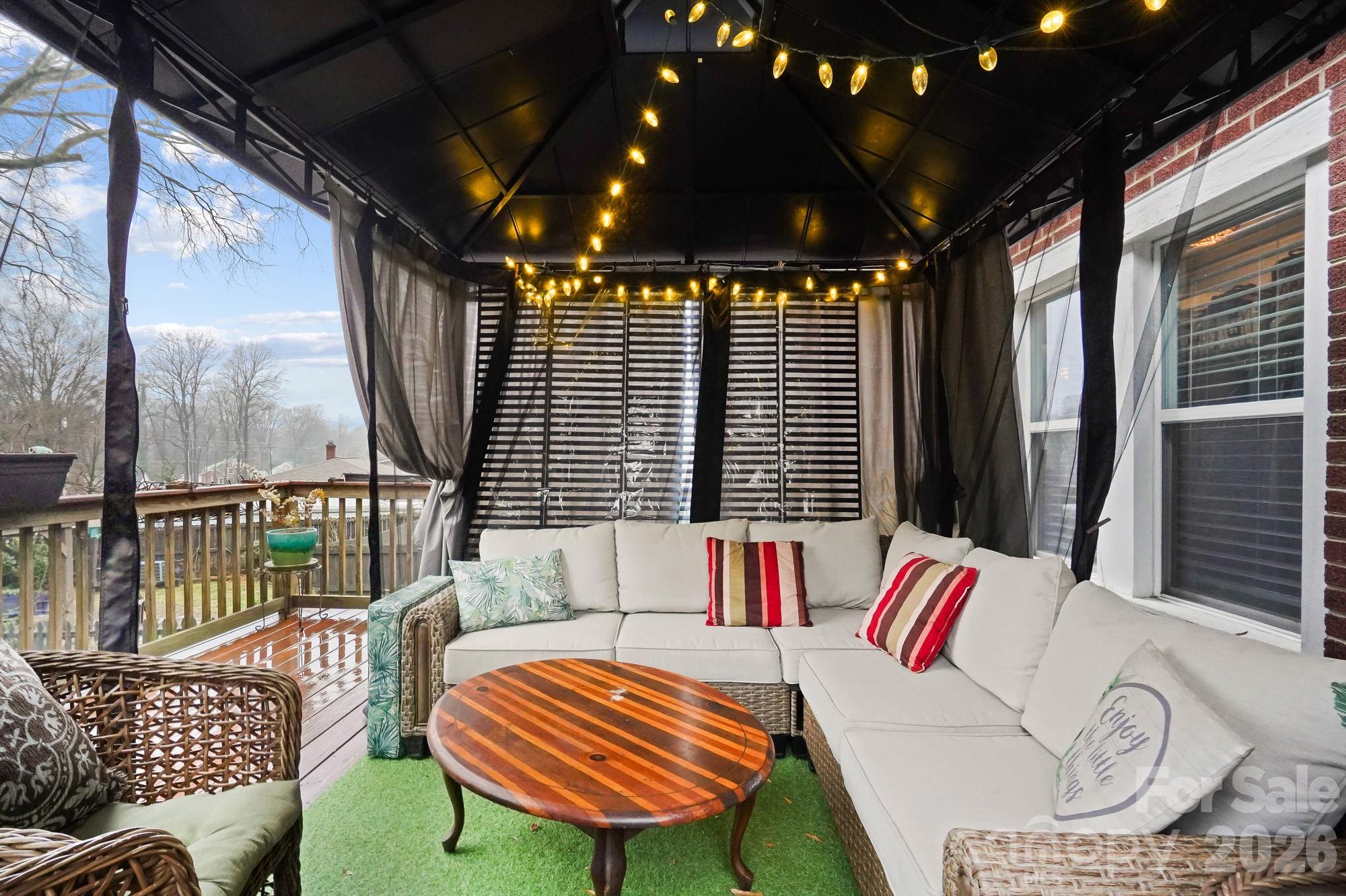 514 Jackson Park Road Kannapolis, NC 28083 - Photo 33 of 48 a balcony with furniture and a large window
