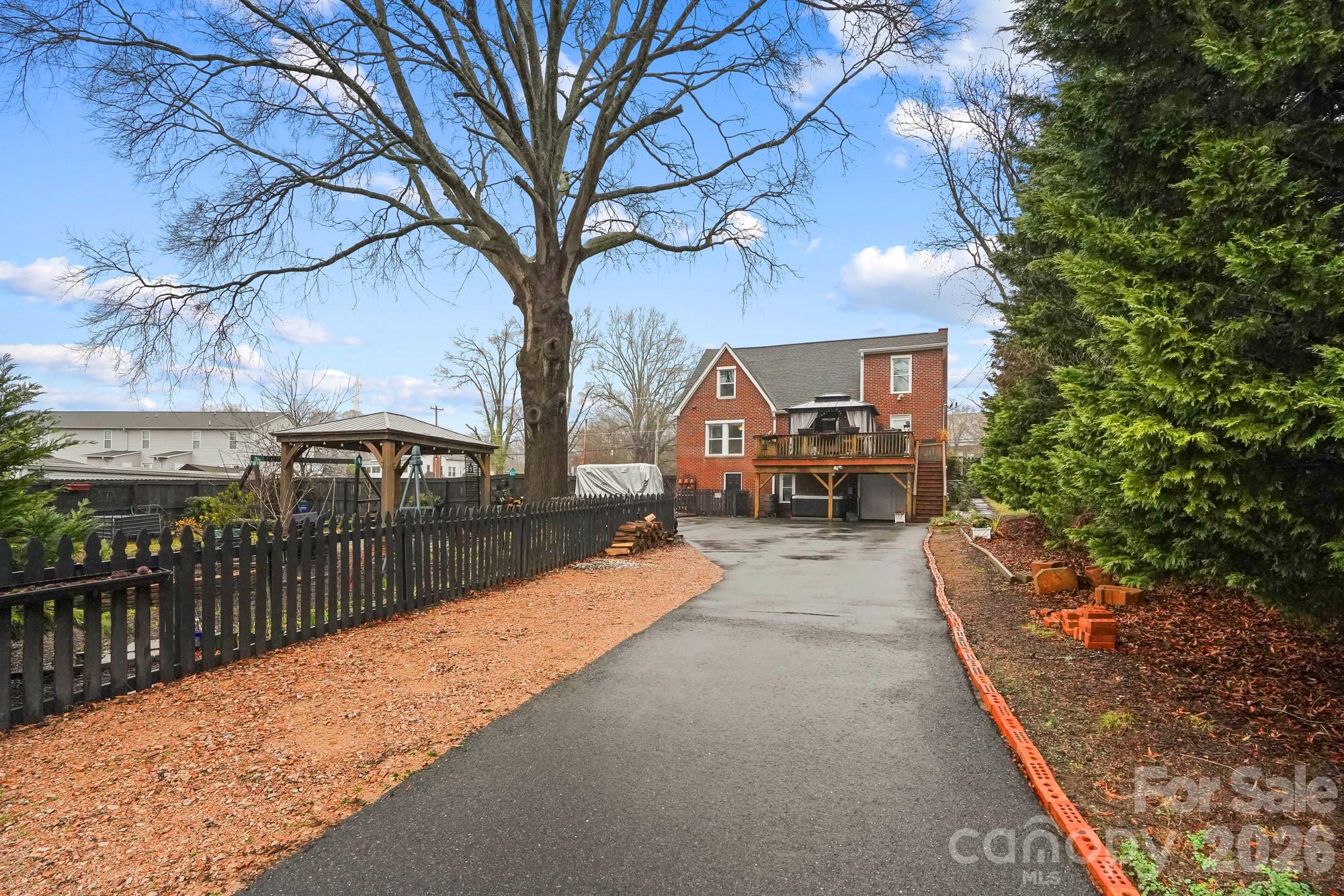 514 Jackson Park Road Kannapolis, NC 28083 - Photo 38 of 48 a view of a house with a backyard