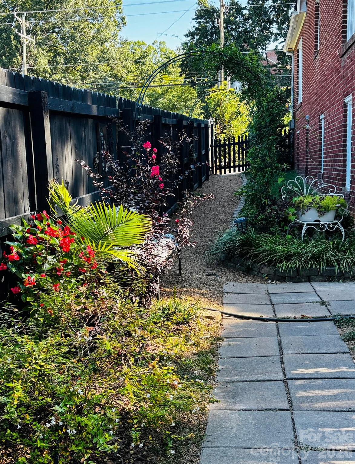 514 Jackson Park Road Kannapolis, NC 28083 - Photo 39 of 48 a view of a house with a yard and potted plants