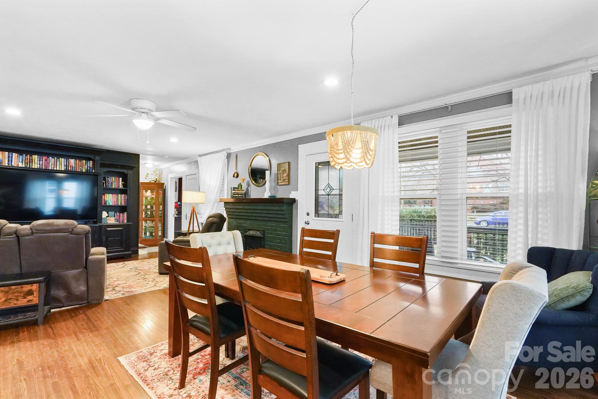 514 Jackson Park Road Kannapolis, NC 28083 - Photo 5 of 48 a living room with furniture and a flat screen tv