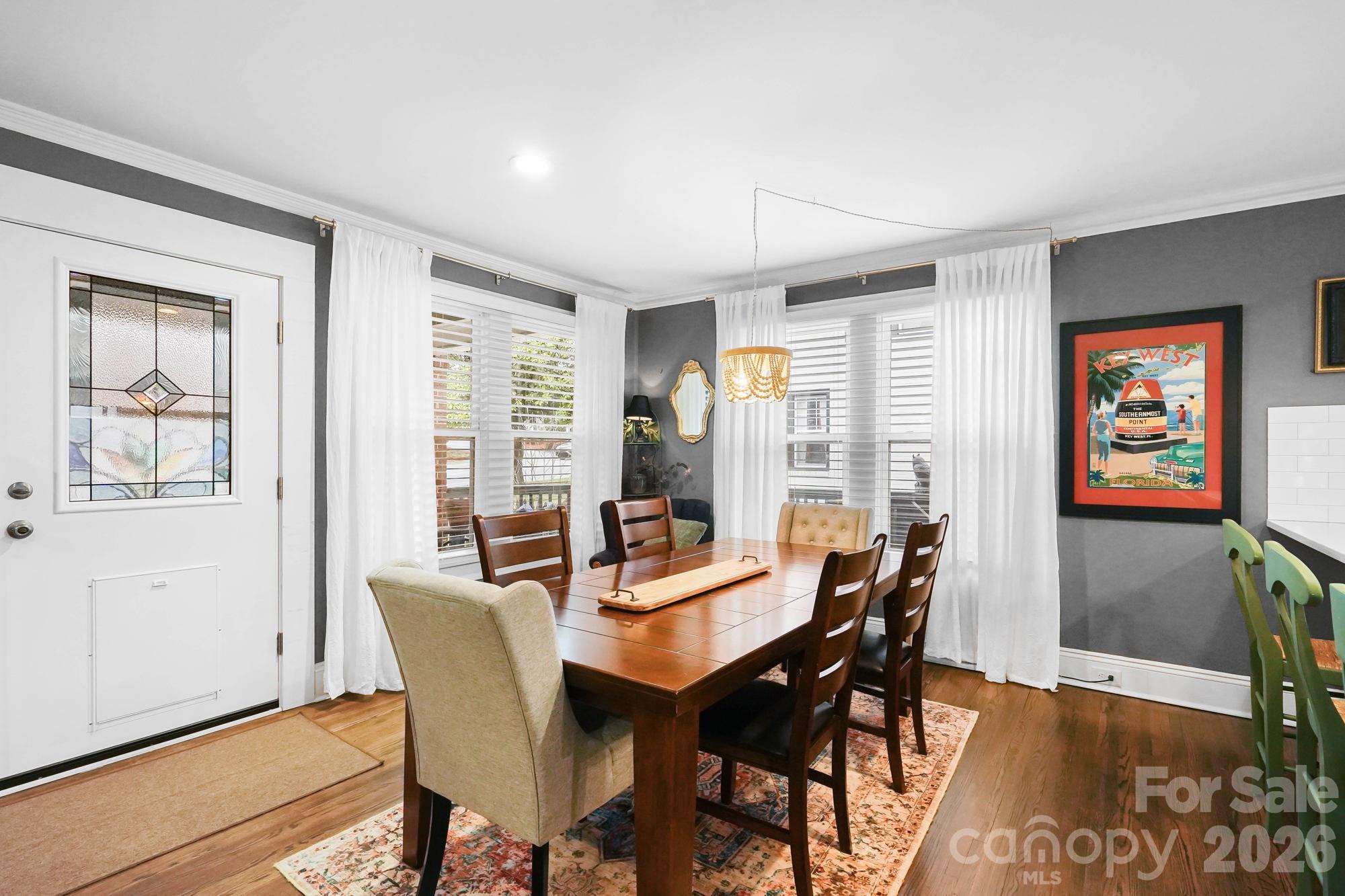 514 Jackson Park Road Kannapolis, NC 28083 - Photo 6 of 48 a view of a dining room with furniture window and wooden floor