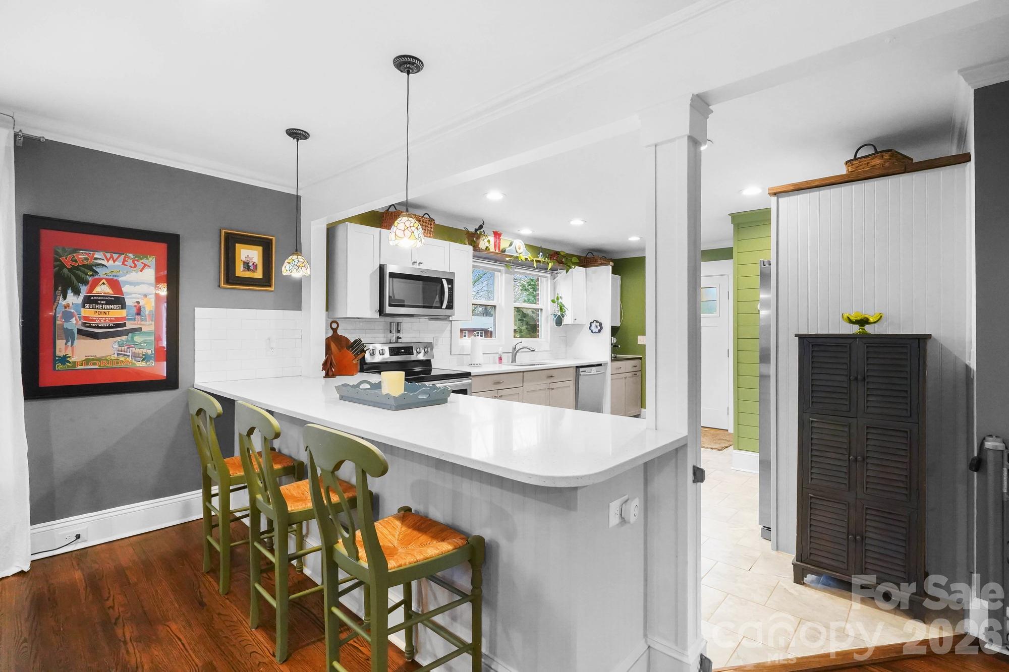514 Jackson Park Road Kannapolis, NC 28083 - Photo 7 of 48 a large kitchen with a table and chairs