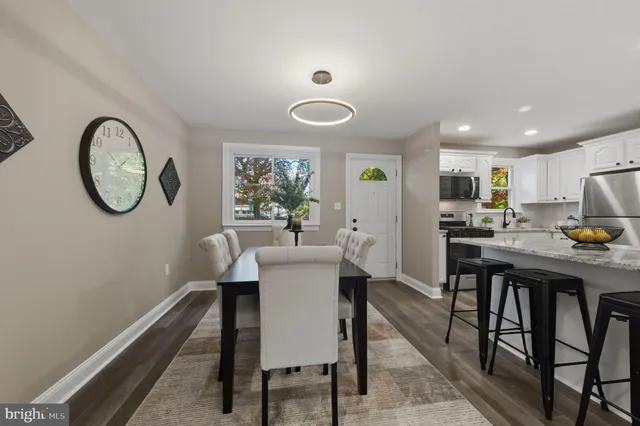 a view of a hallway view with staircase