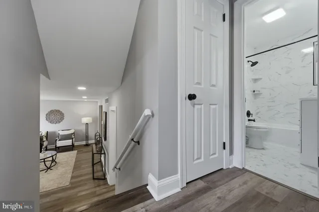 a bathroom with a sink a vanity and a mirror