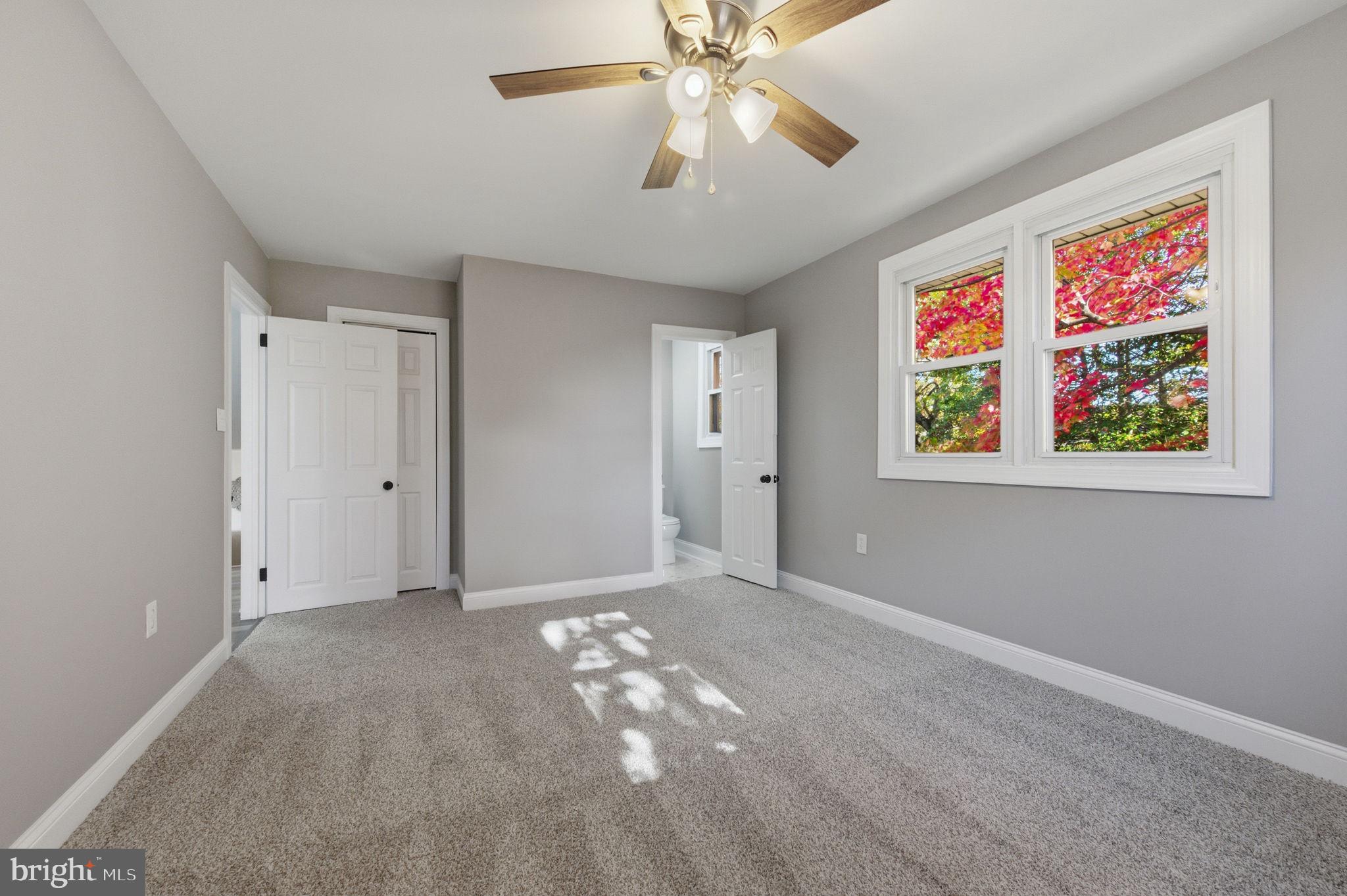 2247 Silverside Road Wilmington, DE 19810 - Photo 19 of 33 a view of an empty room with a fan
