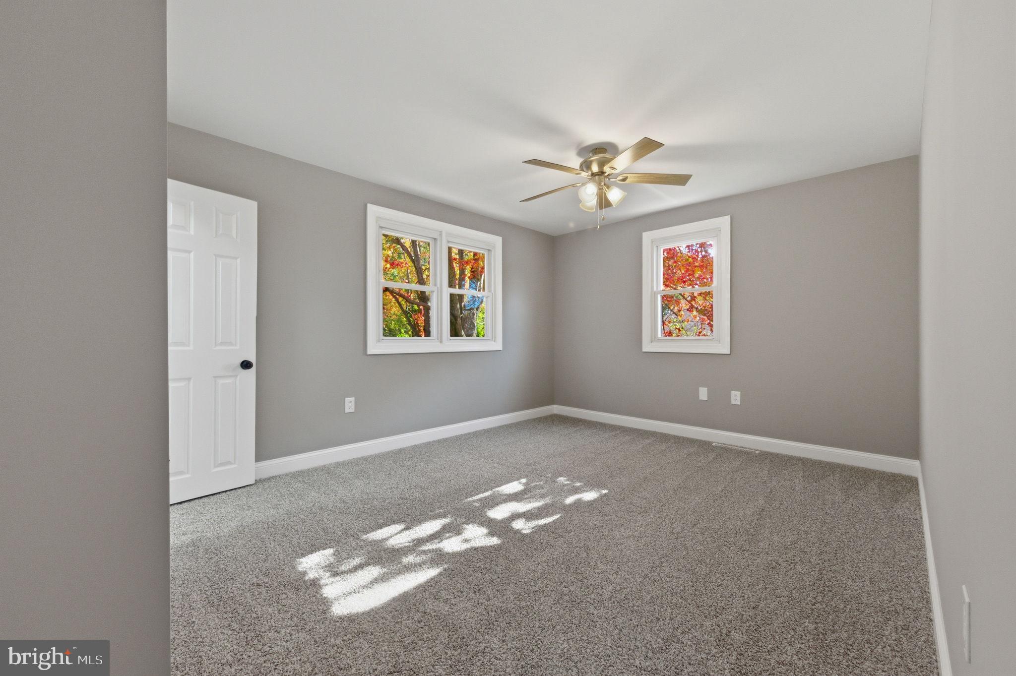2247 Silverside Road Wilmington, DE 19810 - Photo 19 of 35 a view of an empty room with a window