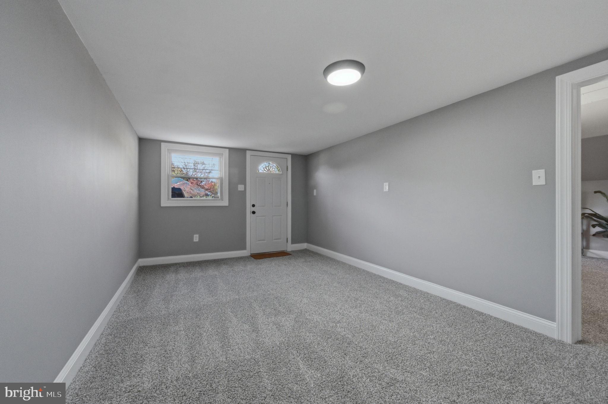 2247 Silverside Road Wilmington, DE 19810 - Photo 30 of 35 an empty room with windows