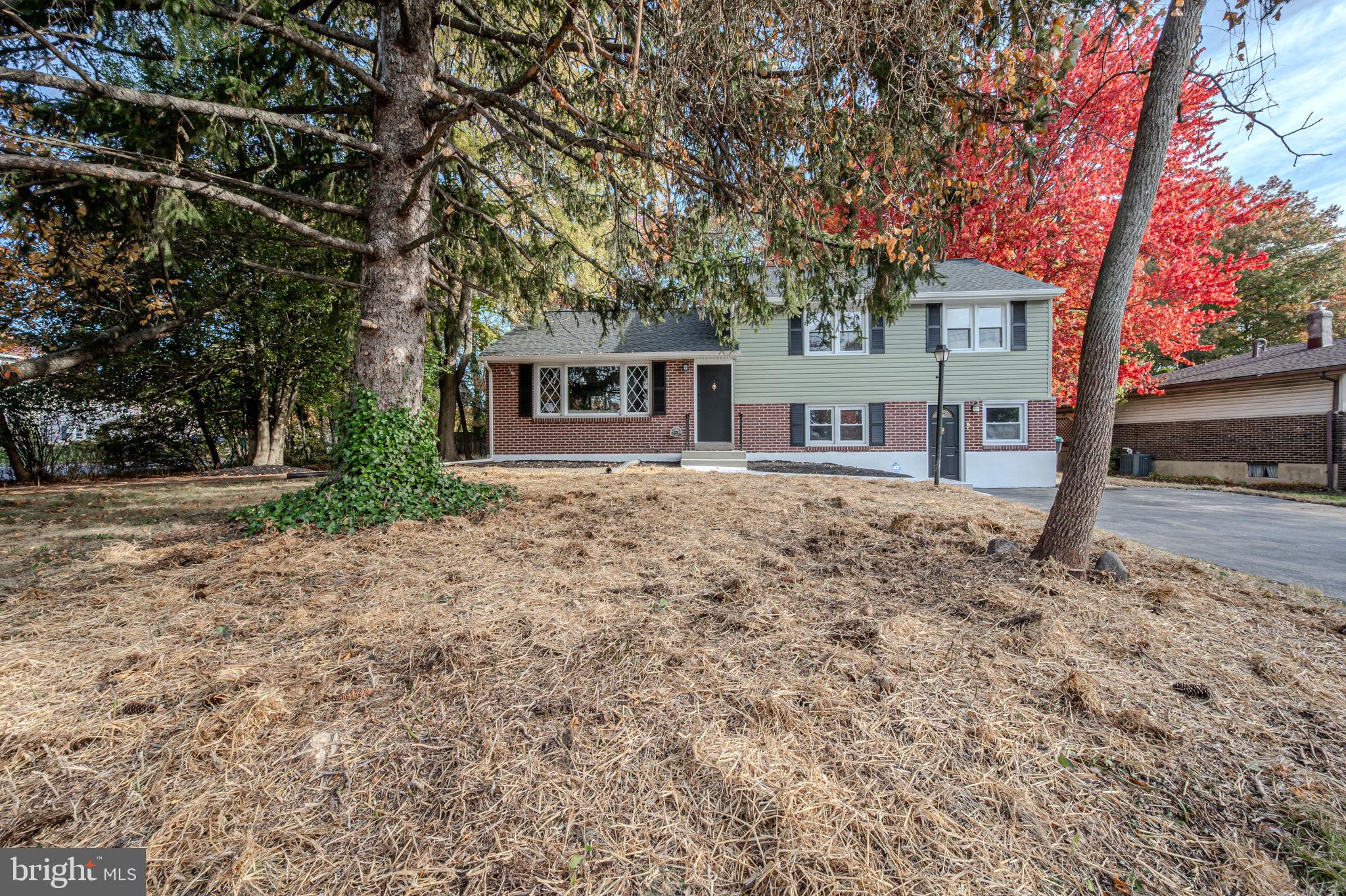 2247 Silverside Road Wilmington, DE 19810 - Photo 3 of 33 a front view of a house with garden
