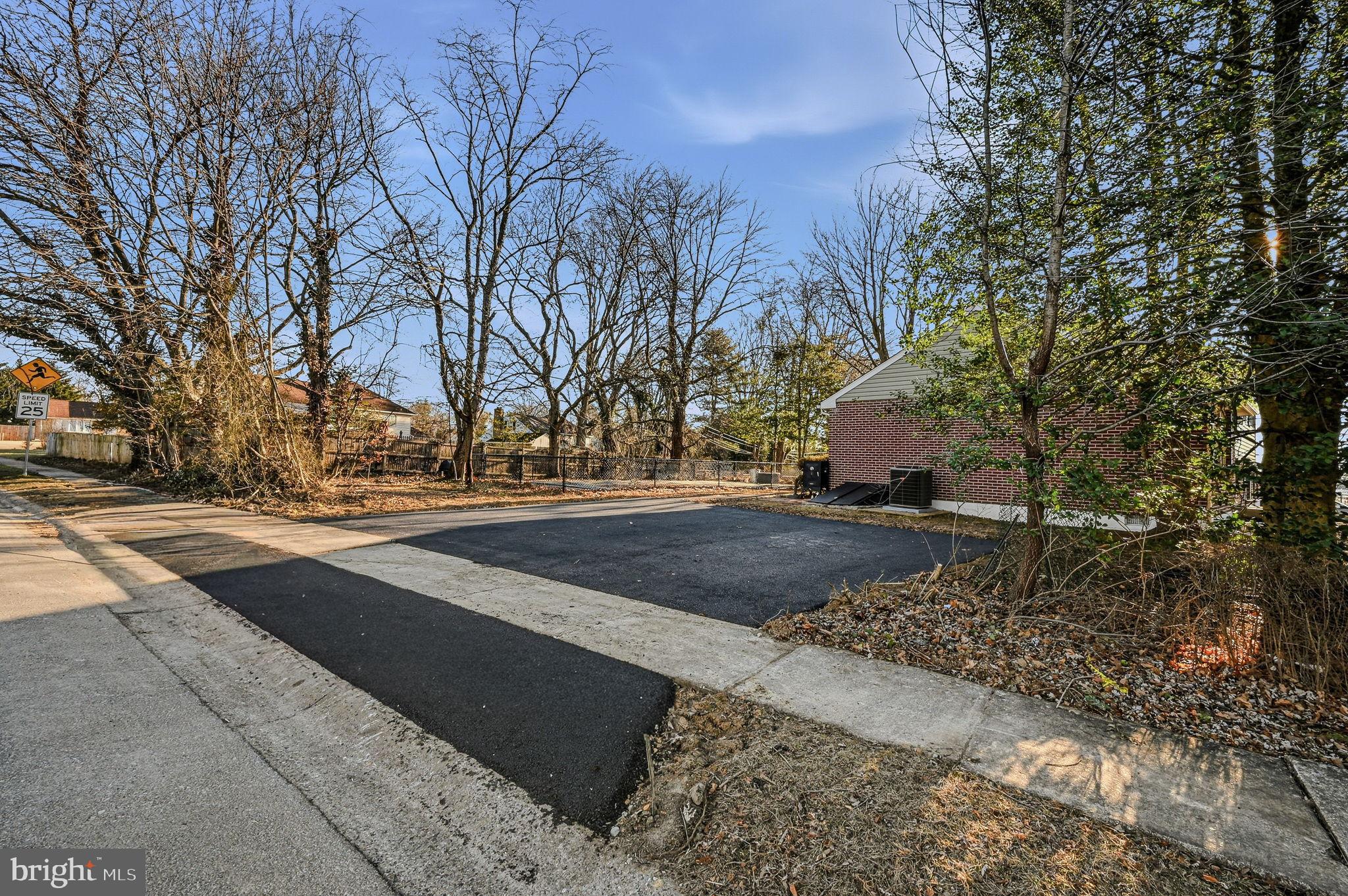 2247 Silverside Road Wilmington, DE 19810 - Photo 3 of 35 a view of road with large trees