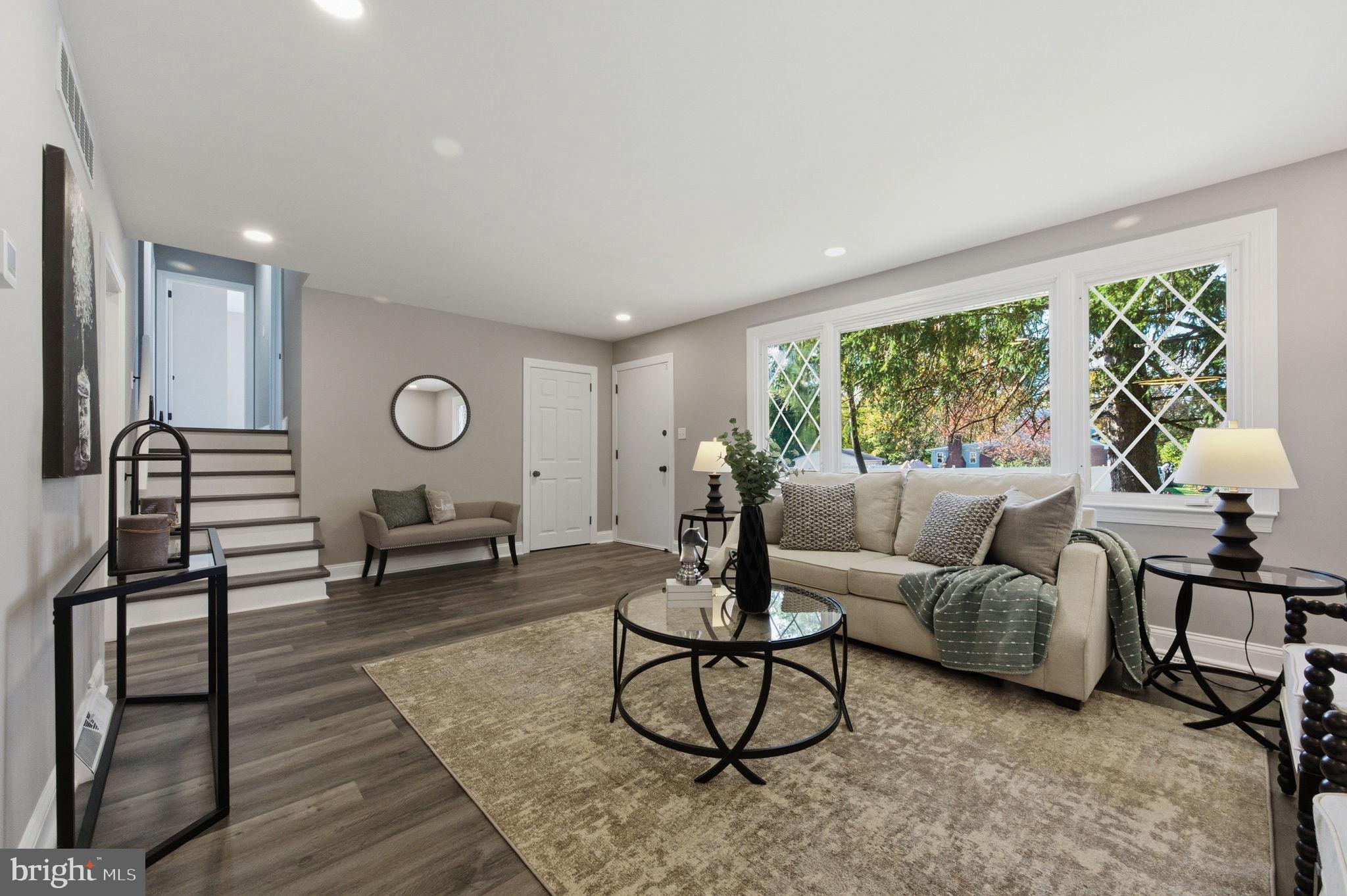 2247 Silverside Road Wilmington, DE 19810 - Photo 4 of 33 a living room with furniture and a window