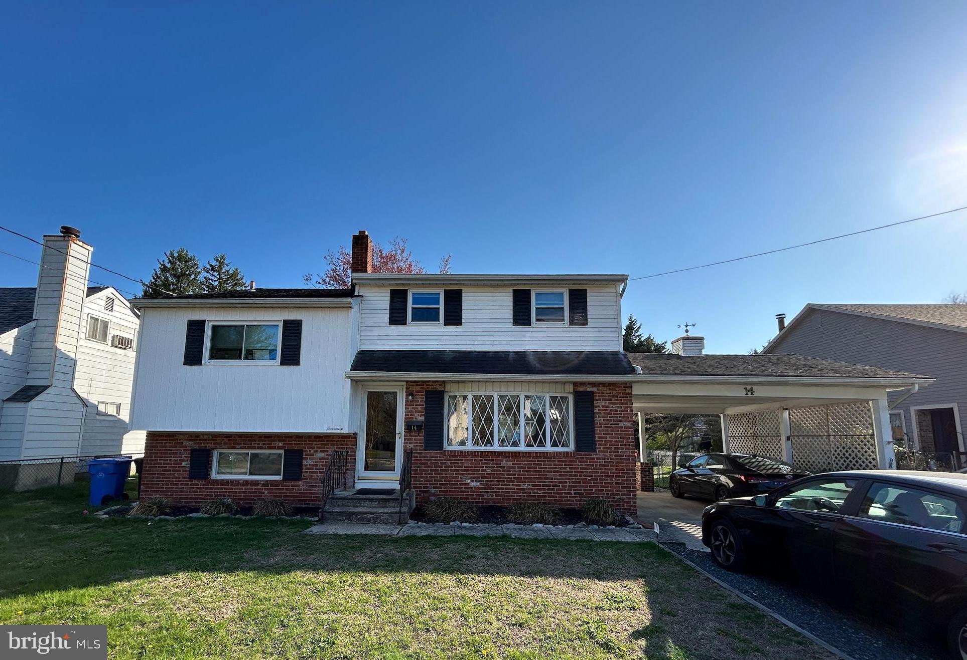 14 Georgetown Road Glassboro, NJ 08028 - Photo 2 of 15 a front view of a house with garden