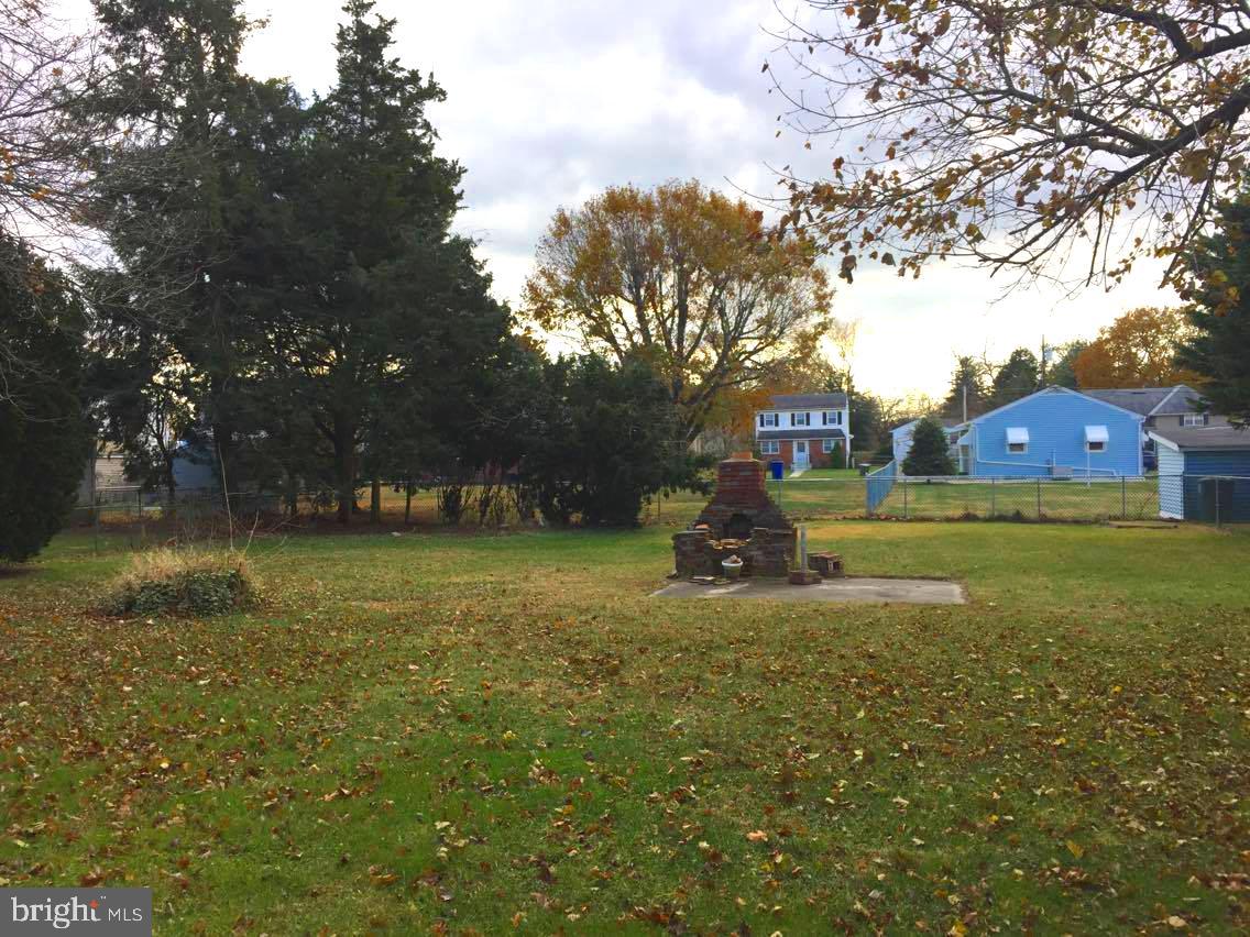 14 Georgetown Road Glassboro, NJ 08028 - Photo 4 of 15 a view of yard with swimming pool and green space