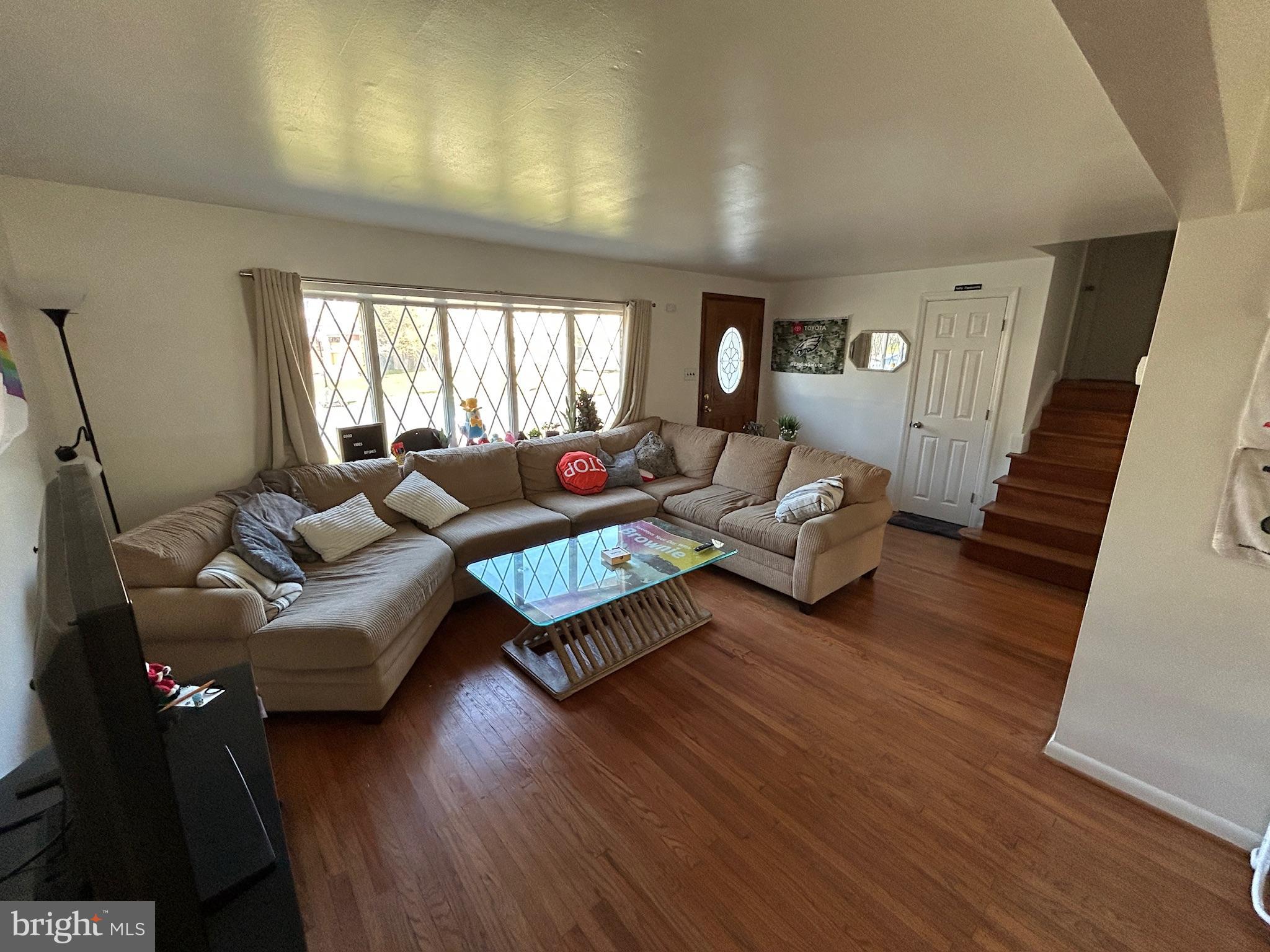 14 Georgetown Road Glassboro, NJ 08028 - Photo 5 of 15 a living room with furniture and a large window