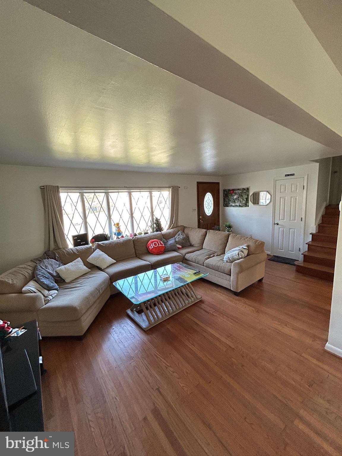 14 Georgetown Road Glassboro, NJ 08028 - Photo 6 of 15 a living room with furniture and a wooden floor