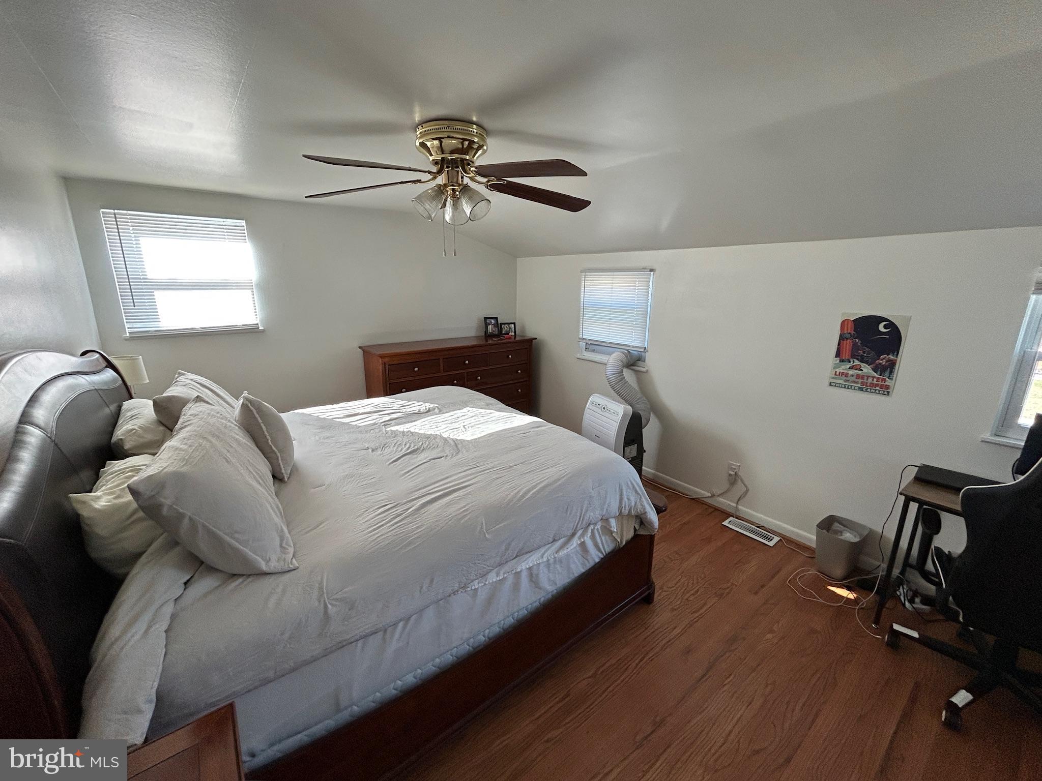 14 Georgetown Road Glassboro, NJ 08028 - Photo 9 of 15 a bedroom with a bed and wooden floor