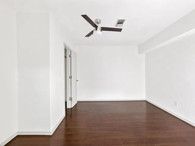 a view of a livingroom with wooden floor