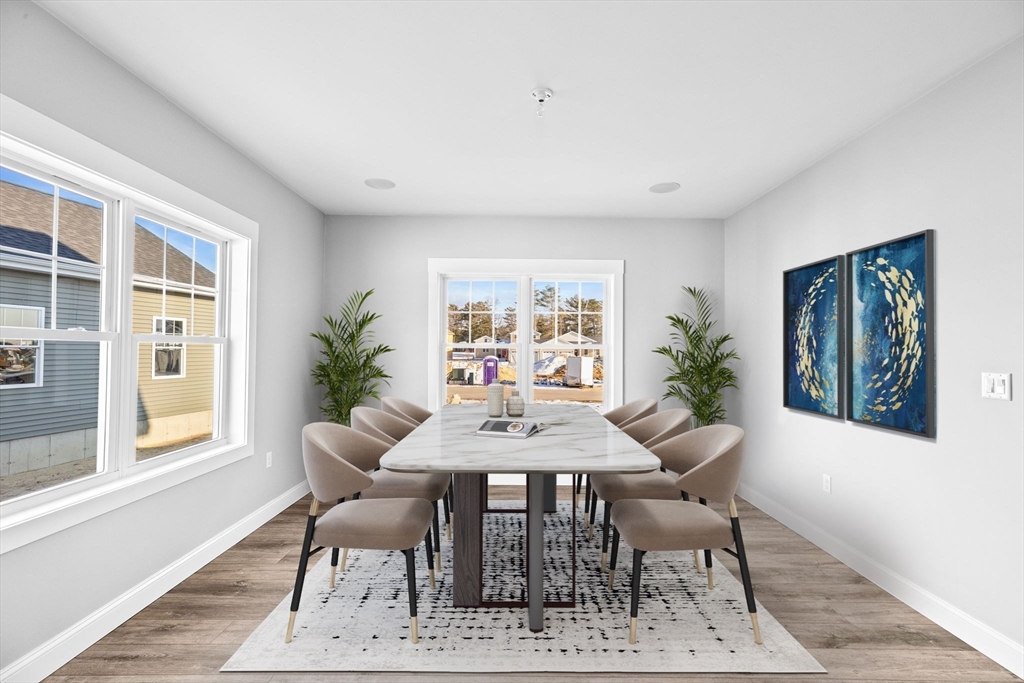 8 Beacon Street, Unit 80 Onset, MA 02558 - Photo 3 of 16 a dining room with furniture and window