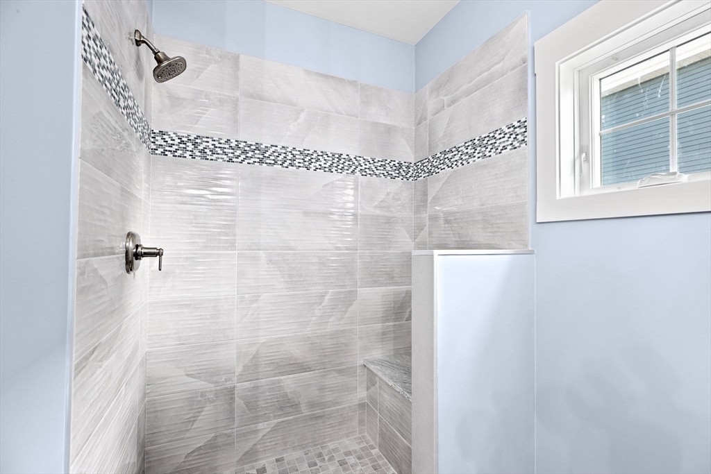 8 Beacon Street, Unit 80 Onset, MA 02558 - Photo 6 of 16 a bathroom with a shower