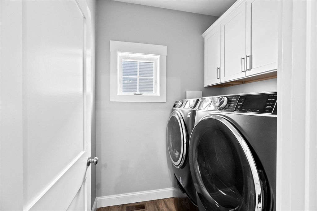 8 Beacon Street, Unit 80 Onset, MA 02558 - Photo 8 of 16 a utility room with dryer and washer