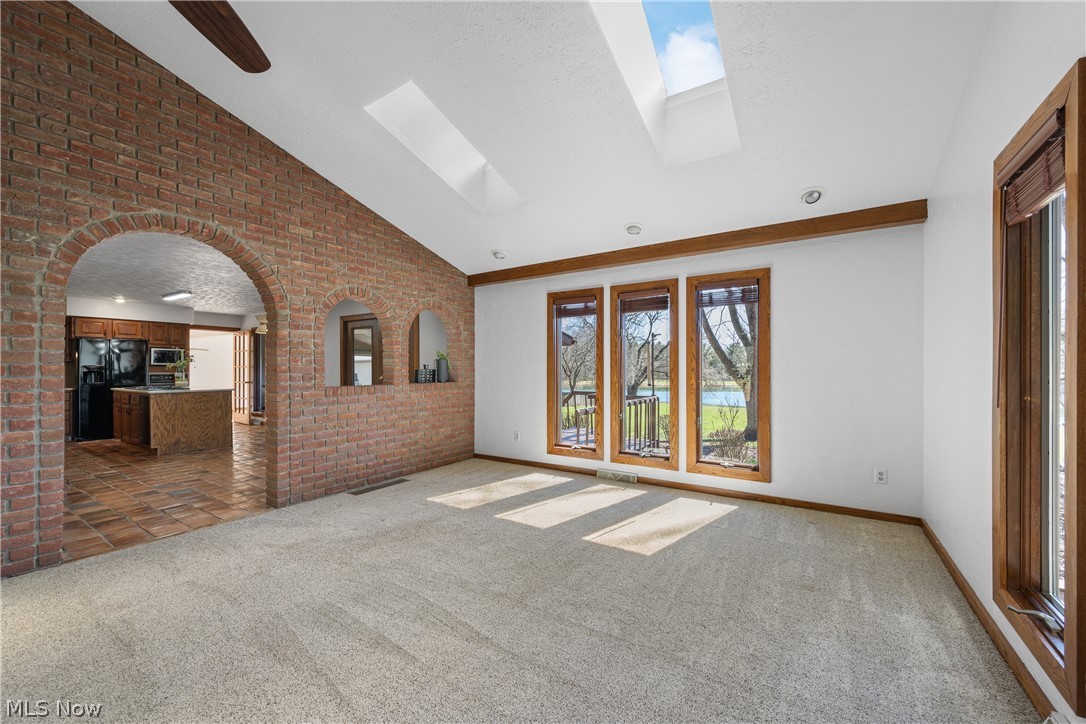 490 Johnson Road Kent, OH 44240 - Photo 11 of 49 Living room offers more stunning lake views.