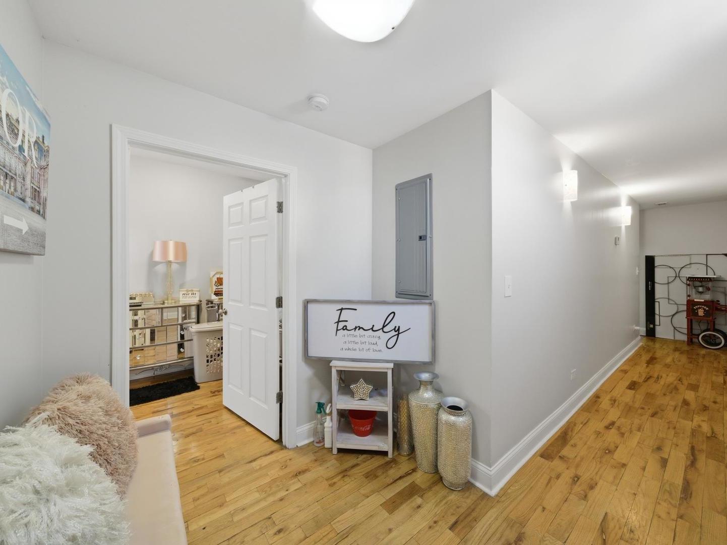1253 South Tripp Avenue Chicago, IL 60623 - Photo 13 of 21 a view of a kitchen with furniture and a bed