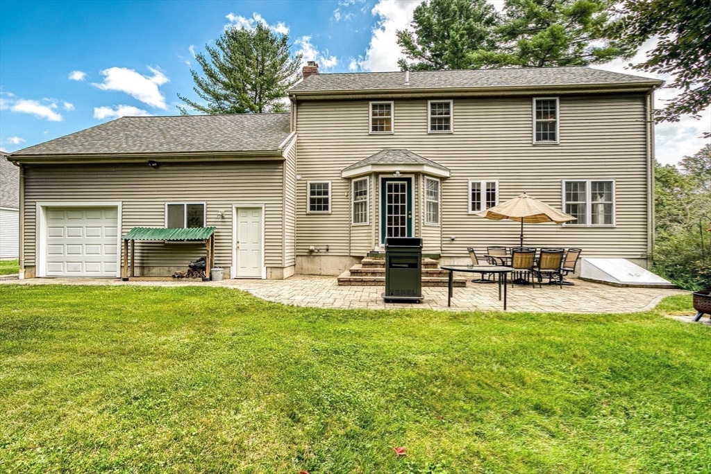 46 A School Street Upton, MA 01568 - Photo 30 of 42 a view of a house with a yard