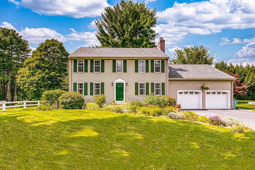 46 A School Street Upton, MA 01568 - Photo 31 of 42 a front view of a house with swimming pool
