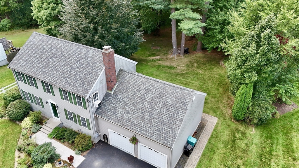 46 A School Street Upton, MA 01568 - Photo 38 of 42 aerial view of a house with a yard