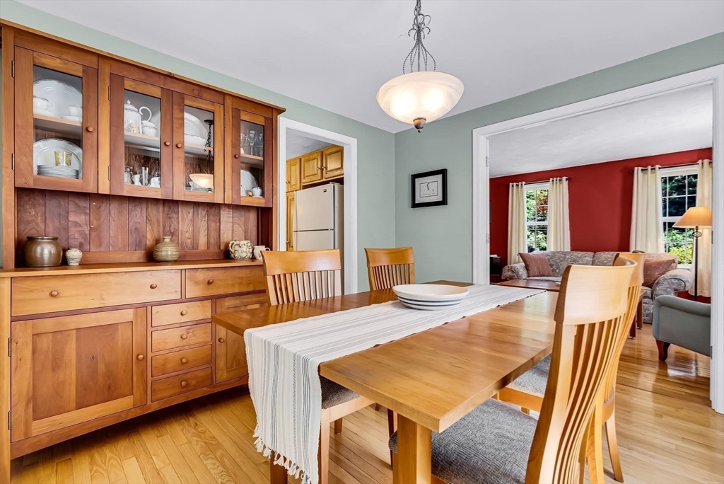46 A School Street Upton, MA 01568 - Photo 10 of 42 a view of a dining room with furniture window and wooden floor