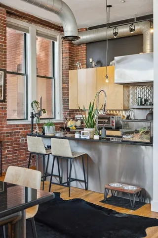 a table with chairs and window