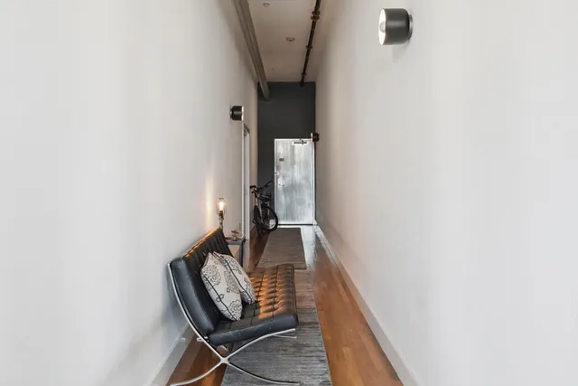 a view of balcony with furniture