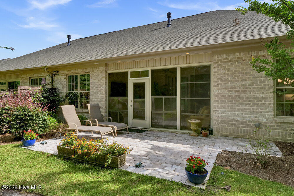 697 Jenoa Loop Castle Hayne, NC 28429 - Photo 30 of 54 Rear Exterior and patio