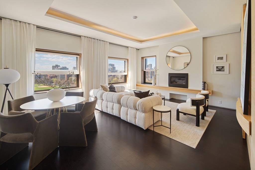 a living room with furniture and a table