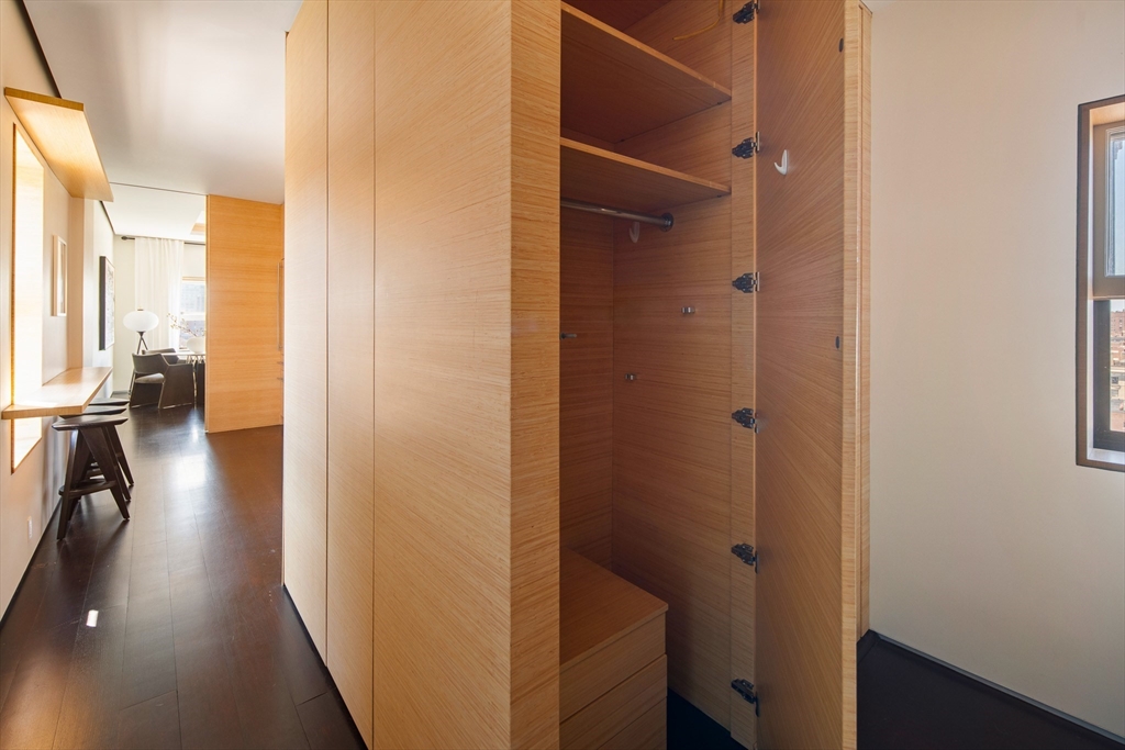 48 Beacon Street, Unit 12F Boston, MA 02108 - Photo 13 of 21 a view of hallway with wooden floor