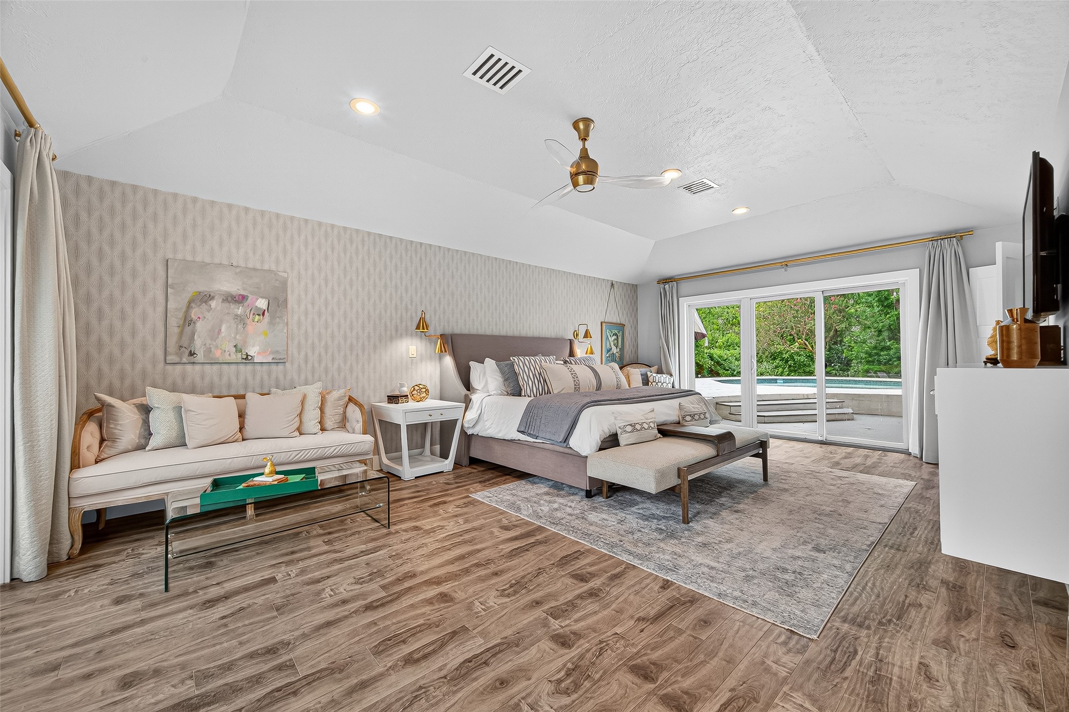 415 Ramblewood Road Houston, TX 77079 - Photo 19 of 49 Huge primary bedroom has a seating area and great view of the pool area.